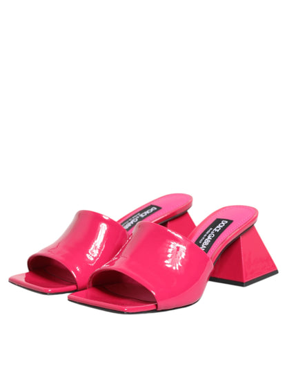 Mules Sandals by Dolce & Gabbana for women in calf leather gold & pink showcases a sculptural silhouette as Women's Calf Leather Mules Sandals, defined by a sculptural block-heel and sculptural open toe style for a sculptural look.