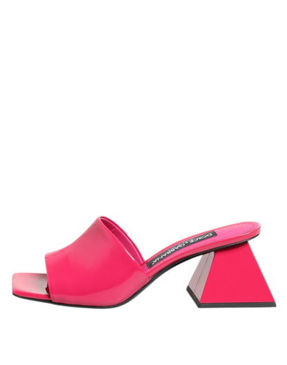 Mules Sandals by Dolce & Gabbana for women in calf leather gold & pink features an effortlessly chic silhouette from the Women's Calf Leather Mules Sandals collection, showcasing a effortlessly chic block-heel and elegant open toe style.