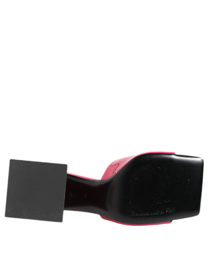 Mules Sandals by Dolce & Gabbana for women in calf leather gold & pink features an statuesque Women's Calf Leather Mules Sandals silhouette with a refined block-heel and elegant open toe style.