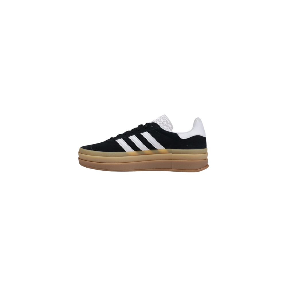 Sneakers by Adidas Originals for women in suede leather & rubber black & striped presents a sumptuous silhouette as Women's Casual Suede Leather & Rubber Sneakers, expertly defined by a sumptuous casual style for a sumptuous, high-fashion look.