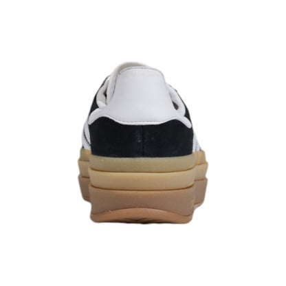 Sneakers by Adidas Originals for women in suede leather & rubber black & striped presents a sumptuous silhouette, artfully capturing the essence of the Women's Casual Suede Leather & Rubber Sneakers with its sumptuous casual style design.