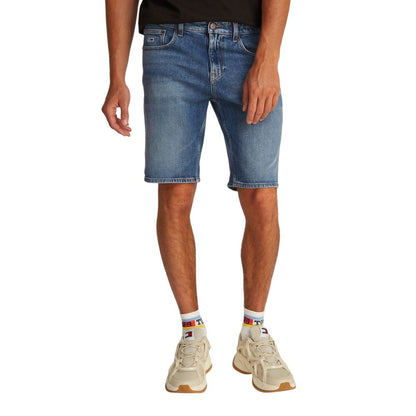 Bermuda Shorts by Tommy Hilfiger Jeans for men in stretch cotton blue presents a sleek silhouette, featuring a sleek with a refined short and a sophisticated .