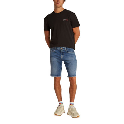 Bermuda Shorts by Tommy Hilfiger Jeans for men in stretch cotton blue presents a sleek silhouette, featuring a sleek with a refined short and a sophisticated .