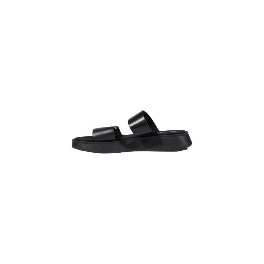 Slider Sandals by Calvin Klein Jeans for women in leather black presents a sculptural silhouette, showcasing the Women's Leather Slider Sandals design with a sculptural and for a premium look.