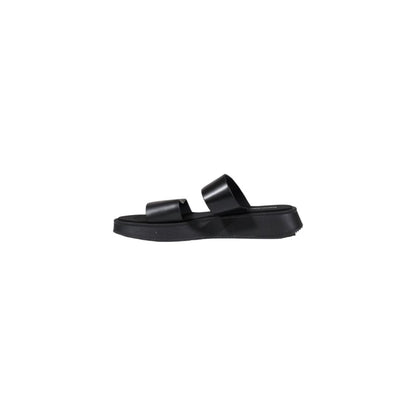 Slider Sandals by Calvin Klein Jeans for women in leather black presents a sculptural silhouette, showcasing the Women's Leather Slider Sandals design with a sculptural and for a premium look.