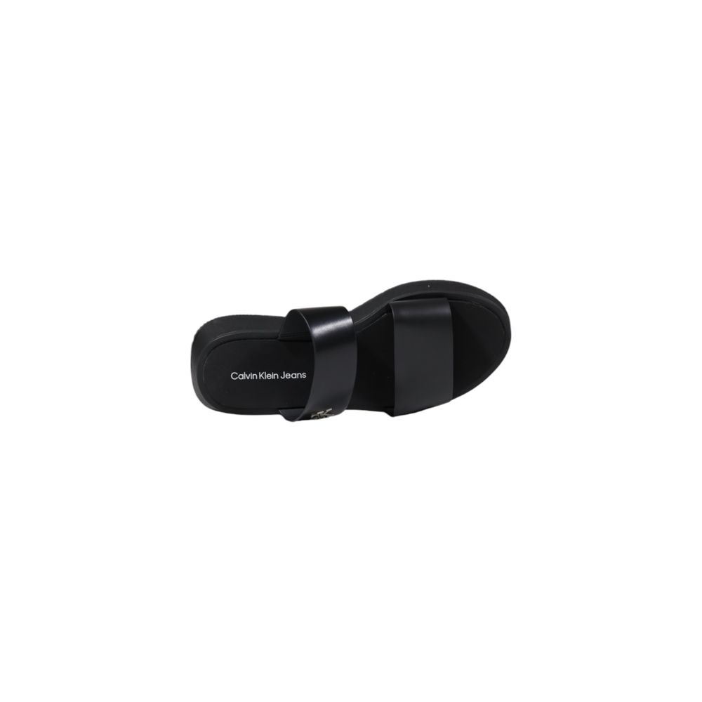 Slider Sandals by Calvin Klein Jeans for women in leather black features an statuesque Women's Leather Slider Sandals silhouette with a refined and elegant .