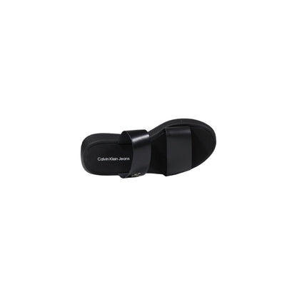 Slider Sandals by Calvin Klein Jeans for women in leather black features an statuesque Women's Leather Slider Sandals silhouette with a refined and elegant .