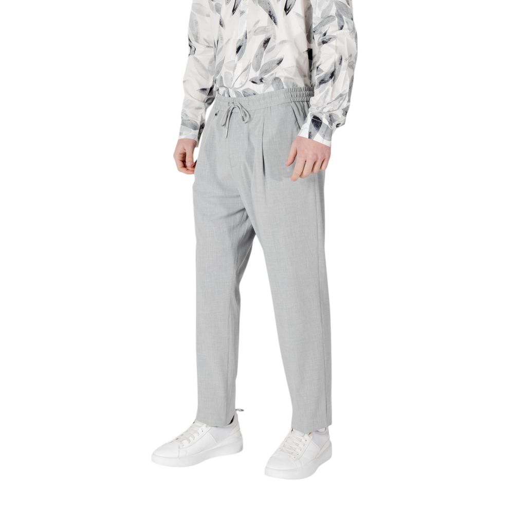 Trousers by Antony Morato for men in stretch polyester & viscose gray presents a smart silhouette, meticulously detailed with a smart regular-fit, a smart long, and a smart .