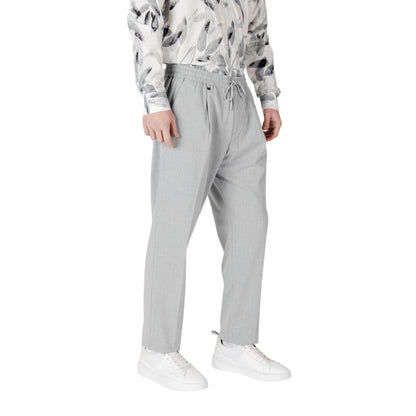 Trousers by Antony Morato for men in stretch polyester & viscose gray features a tailored silhouette with a tailored regular-fit, defined by its long and a sophisticated .
