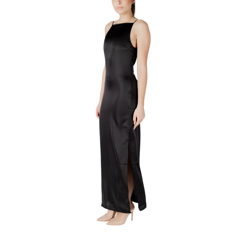 Dress by Only for women in polyester satin black features a dramatic silhouette, showcasing an elegant and that flows into a dramatic maxi long.