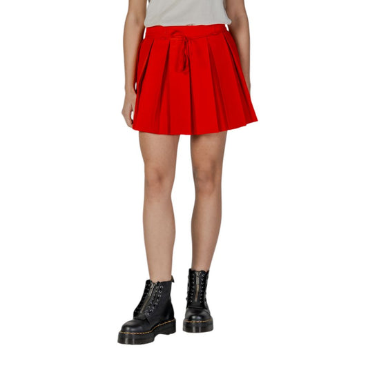 Skirt by Only for women in polyester red features a sublime silhouette, showcasing the sublime design of the Women's Mini Polyester Skirt in a sophisticated mini.