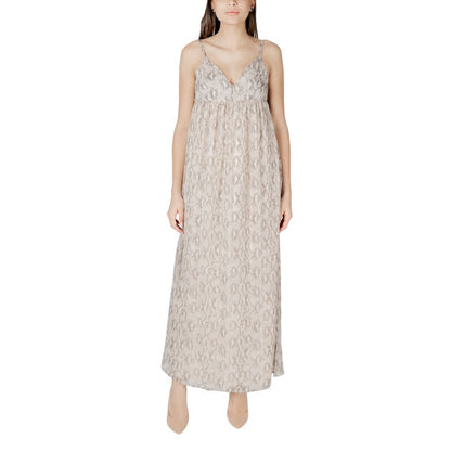 Dress by Only for women in polyester beige features an magnificent silhouette, artfully detailed with a magnificent and that flows into an magnificent maxi long.