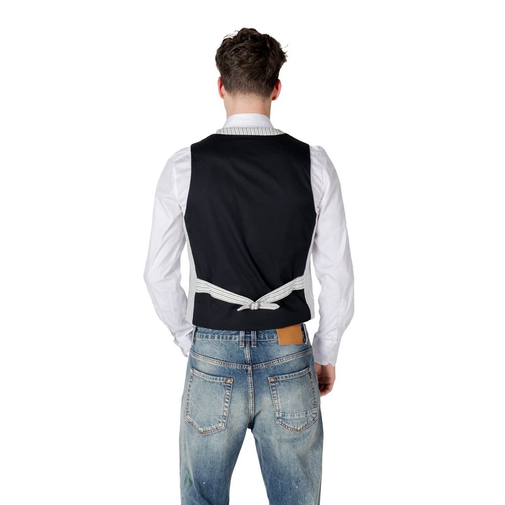 Vest by Gianni Lupo for men in linen & cotton black showcases a utilitarian silhouette, artfully incorporating and a utilitarian for a truly utilitarian finish.