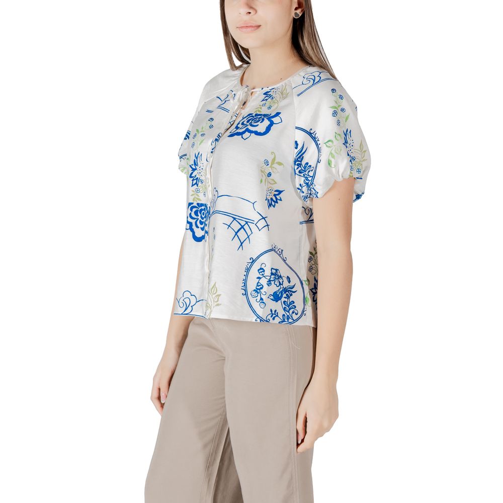 Shirt by ICHI for women in linen polyamide & viscose white showcases a sleek silhouette, elegantly detailed with a sleek and for a sleek finish.