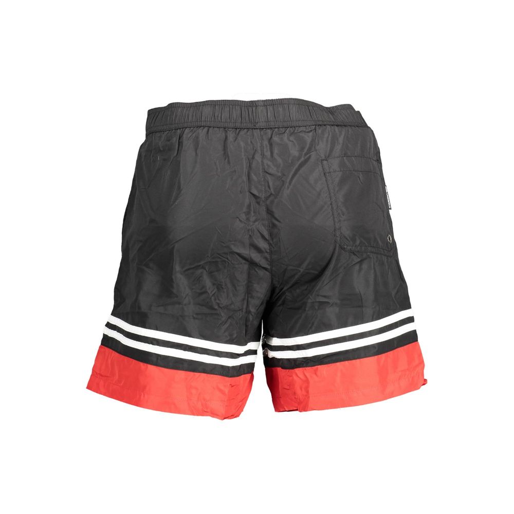 Swim Shorts by Karl Lagerfeld for men in polyester black & print showcases a sculptural silhouette, expertly capturing the sophisticated essence of the sculptural Men's Polyester Swim Shorts design for a premium poolside look.