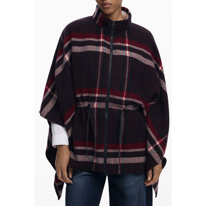 This Cape by Desigual for women in polyester black, patterned, tartan & print presents a voluminous silhouette, showcasing refined and a sophisticated for a voluminous finish.
