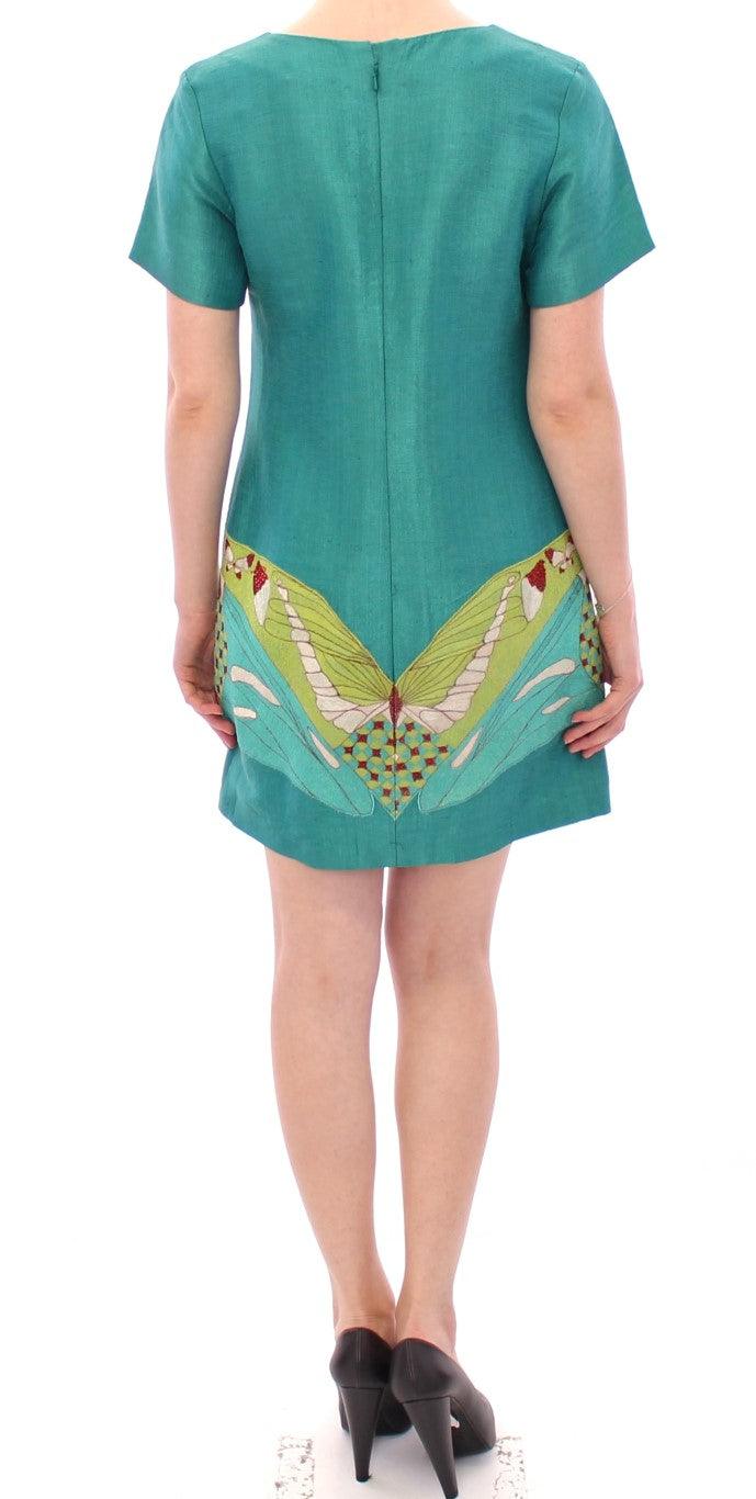 Green Above Knee Mini Dress designed by Lanre Da Silva Ajayi available from Moon Behind The Hill's Women's Clothing range