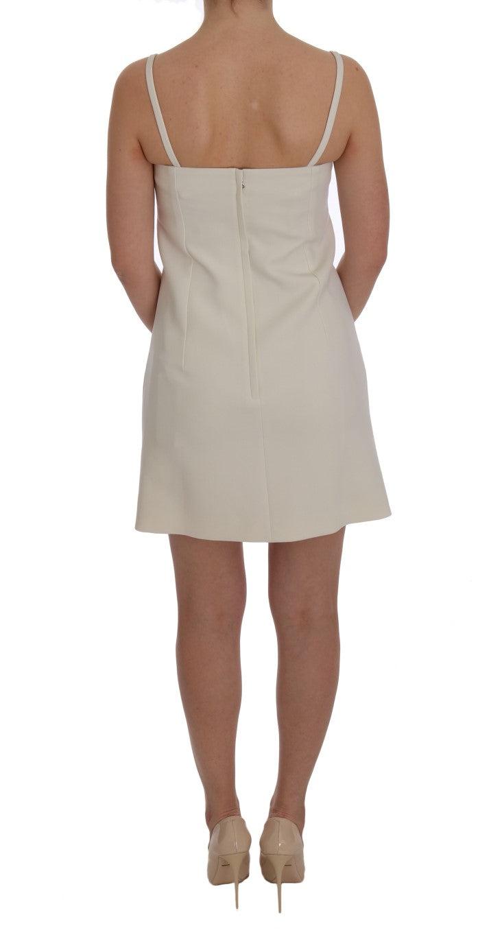 White Wool Stretch Brooch Shift Dress designed by Dolce & Gabbana available from Moon Behind The Hill's Women's Clothing range