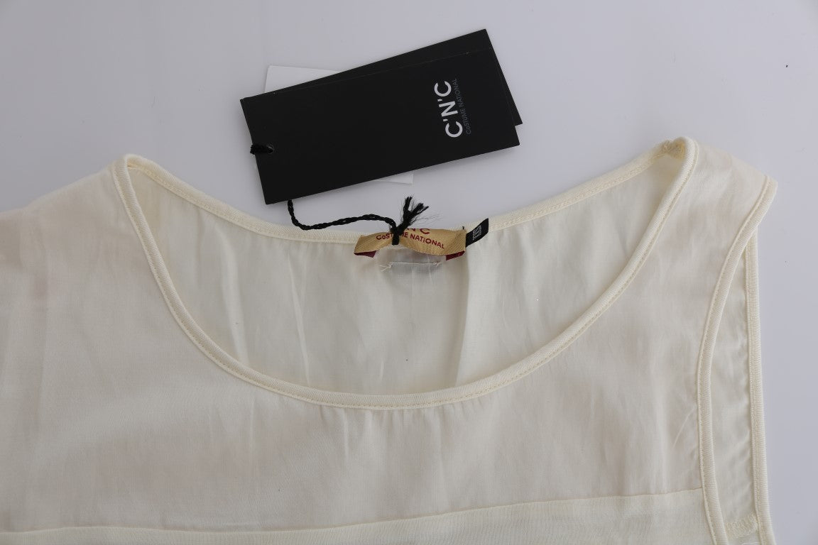 Beige Asymmetric Top Blouse - Designed by Costume National Available to Buy at a Discounted Price on Moon Behind The Hill Online Designer Discount Store