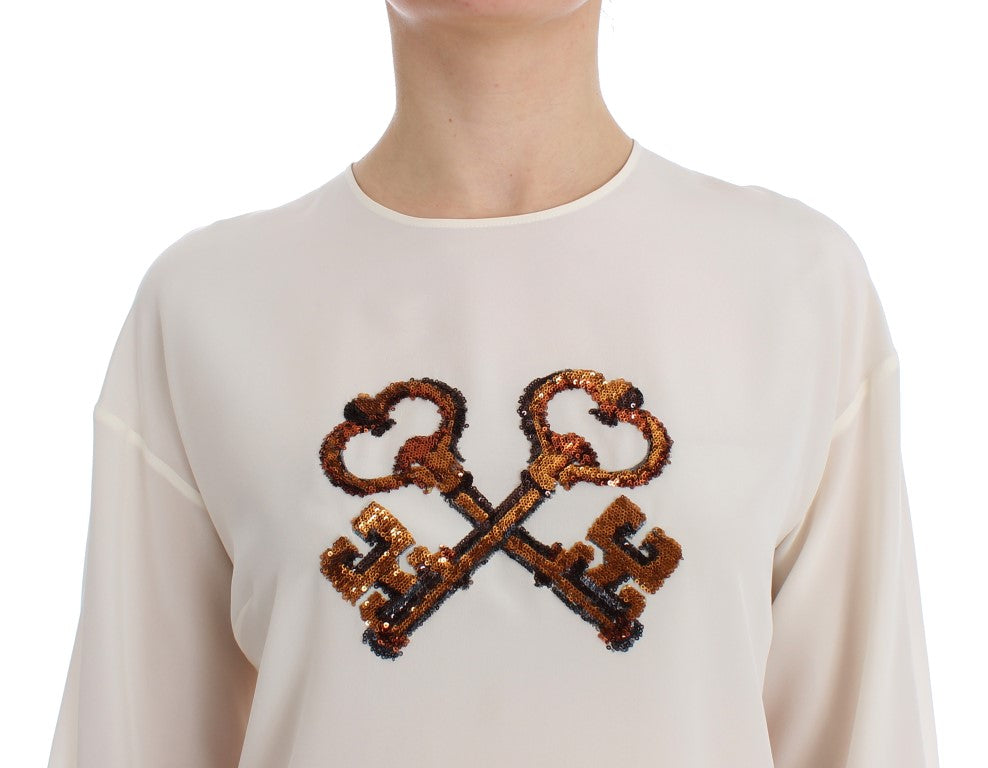 White Sequined Key Silk Blouse T-shirt Top designed by Dolce & Gabbana available from Moon Behind The Hill's Women's Clothing range