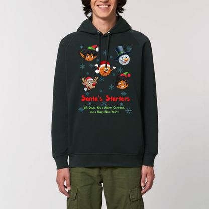 Model wearing a basketball themed Christmas hoodie with 5 cartoon like character heads of 2 elves, 1 snowman, 1 Rudolf and 1 basketball and the heading Santa's Starters and sub heading We Swish you a merry Christmas and a hoopy New Year. The hoodies colour is Black