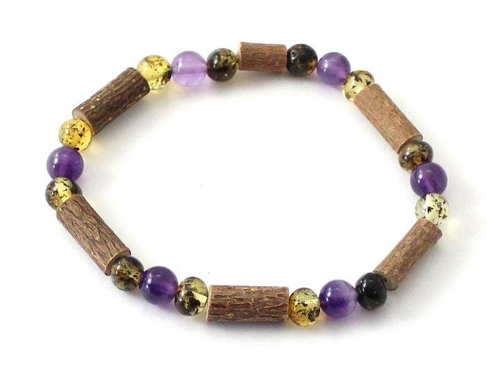 Amber Green Stretch Bracelet With Purple Amethyst and Hazelwood - Designed by TipTopEco Available to Buy at a Discounted Price on Moon Behind The Hill Online Designer Discount Store
