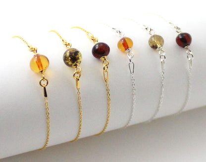 Minimalist Silver Bracelet With Amber Round Bead designed by TipTopEco available from Moon Behind The Hill 's Jewelry > Bracelets > Womens range