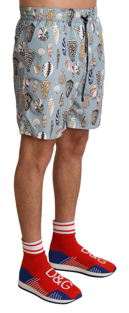 Blue Seashell Beachwear Swimwear Shorts - Designed by Dolce & Gabbana Available to Buy at a Discounted Price on Moon Behind The Hill Online Designer Discount Store