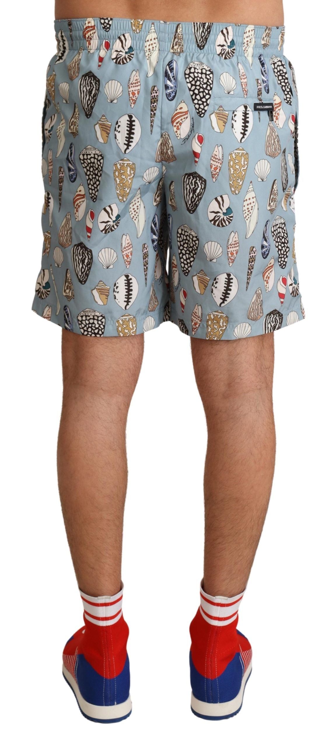 Blue Seashell Beachwear Swimwear Shorts - Designed by Dolce & Gabbana Available to Buy at a Discounted Price on Moon Behind The Hill Online Designer Discount Store