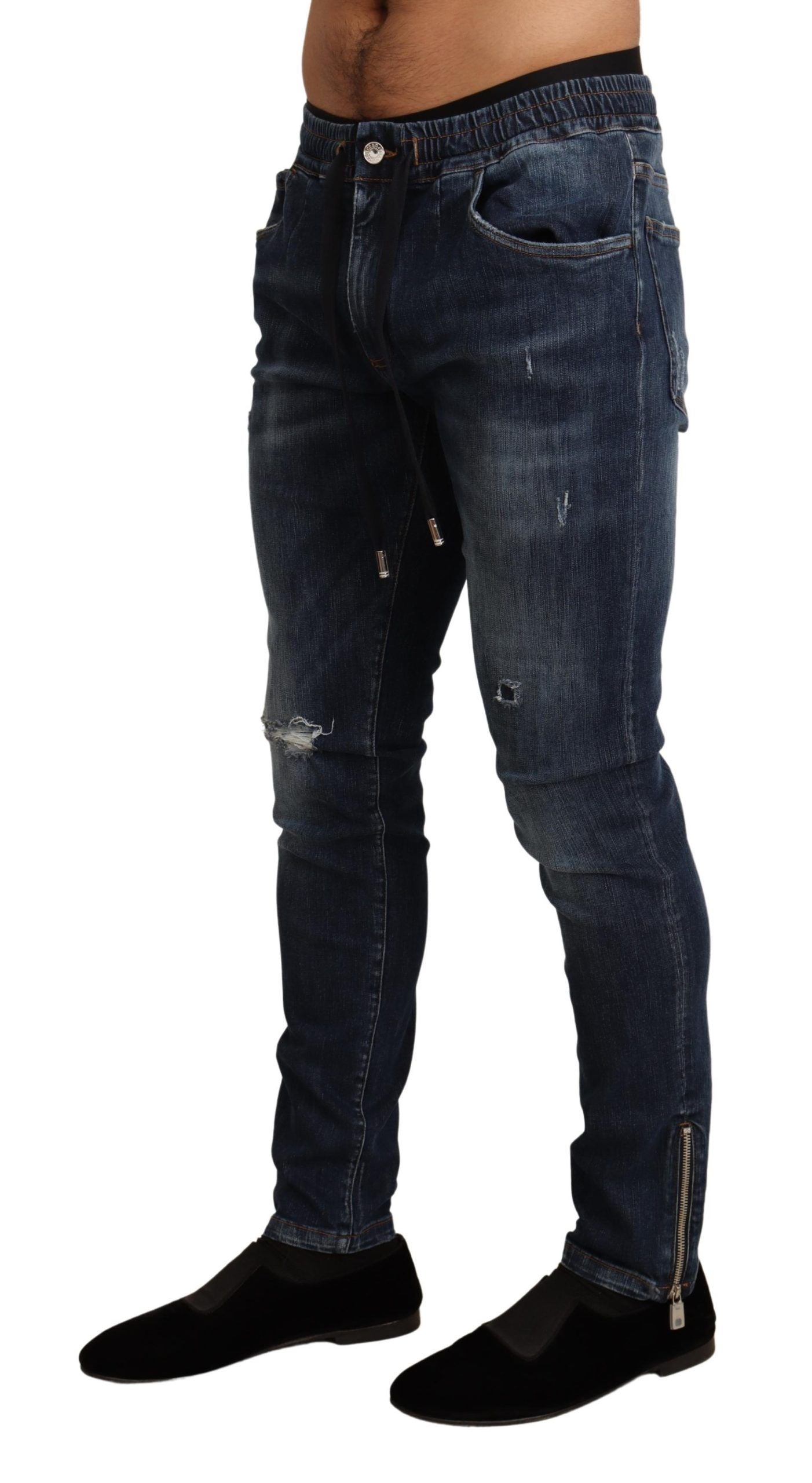 Blue Cotton Stretch Tattered Denim Jeans - Designed by Dolce & Gabbana Available to Buy at a Discounted Price on Moon Behind The Hill Online Designer Discount Store