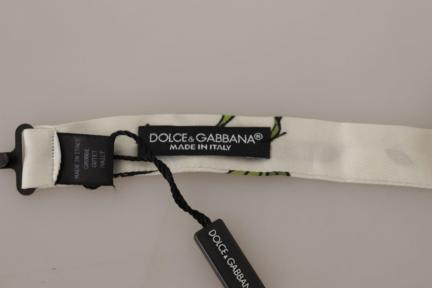 Dolce & Gabbana White Pattern Silk Adjustable Neck Papillon Bow Tie - Designed by Dolce & Gabbana Available to Buy at a Discounted Price on Moon Behind The Hill Online Designer Discount Store