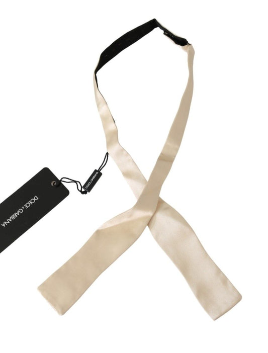 Beige Slim Skinny Men Necktie 100% Silk Tie - Designed by Dolce & Gabbana Available to Buy at a Discounted Price on Moon Behind The Hill Online Designer Discount Store