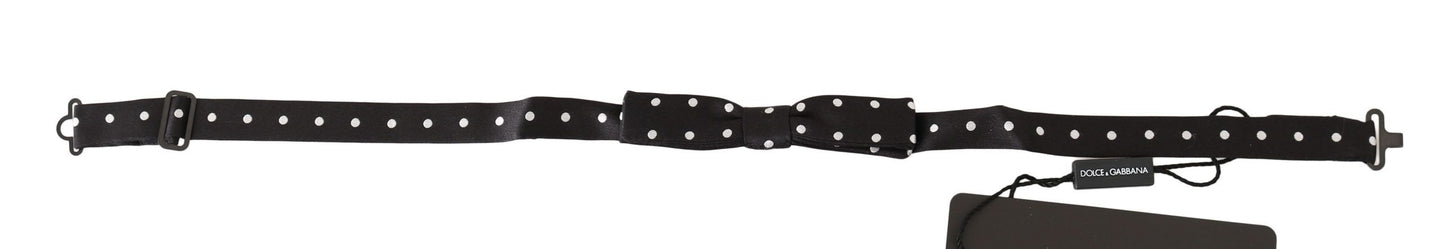 Black 100% Silk Polka Dot Adjustable Neck Bow Tie - Designed by Dolce & Gabbana Available to Buy at a Discounted Price on Moon Behind The Hill Online Designer Discount Store