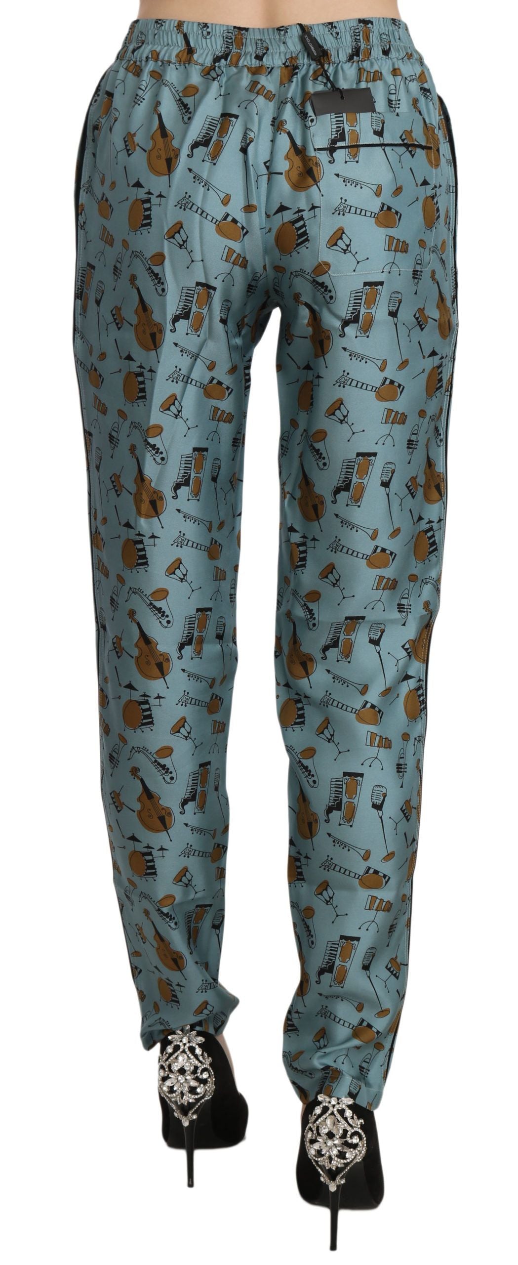 Blue Musical Instruments Print Tapered Pants - Designed by Dolce & Gabbana Available to Buy at a Discounted Price on Moon Behind The Hill Online Designer Discount Store