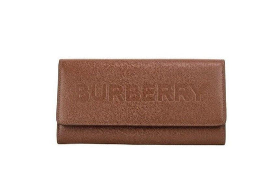Burberry Porter Tan Grained Leather Embossed Continental Clutch Flap Wallet - Designed by Burberry Available to Buy at a Discounted Price on Moon Behind The Hill Online Designer Discount Stor