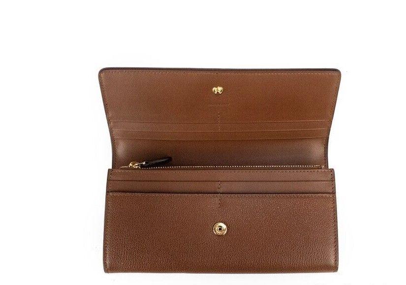 Burberry Porter Tan Grained Leather Embossed Continental Clutch Flap Wallet - Designed by Burberry Available to Buy at a Discounted Price on Moon Behind The Hill Online Designer Discount Stor