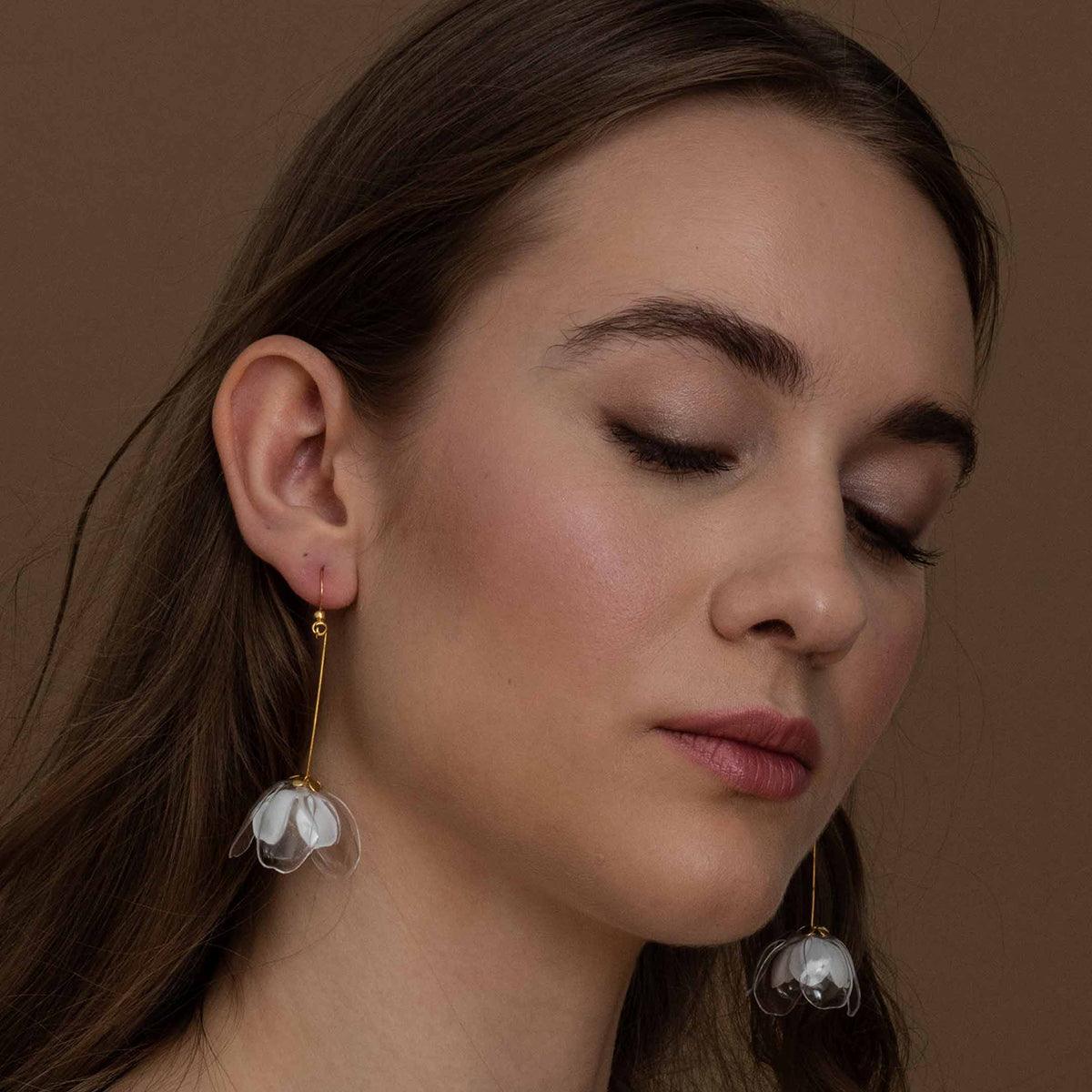 Clear & White Double-Flower Drop Earrings - Designed by Upcycle with Jing Available to Buy at a Discounted Price on Moon Behind The Hill Online Designer Discount Store