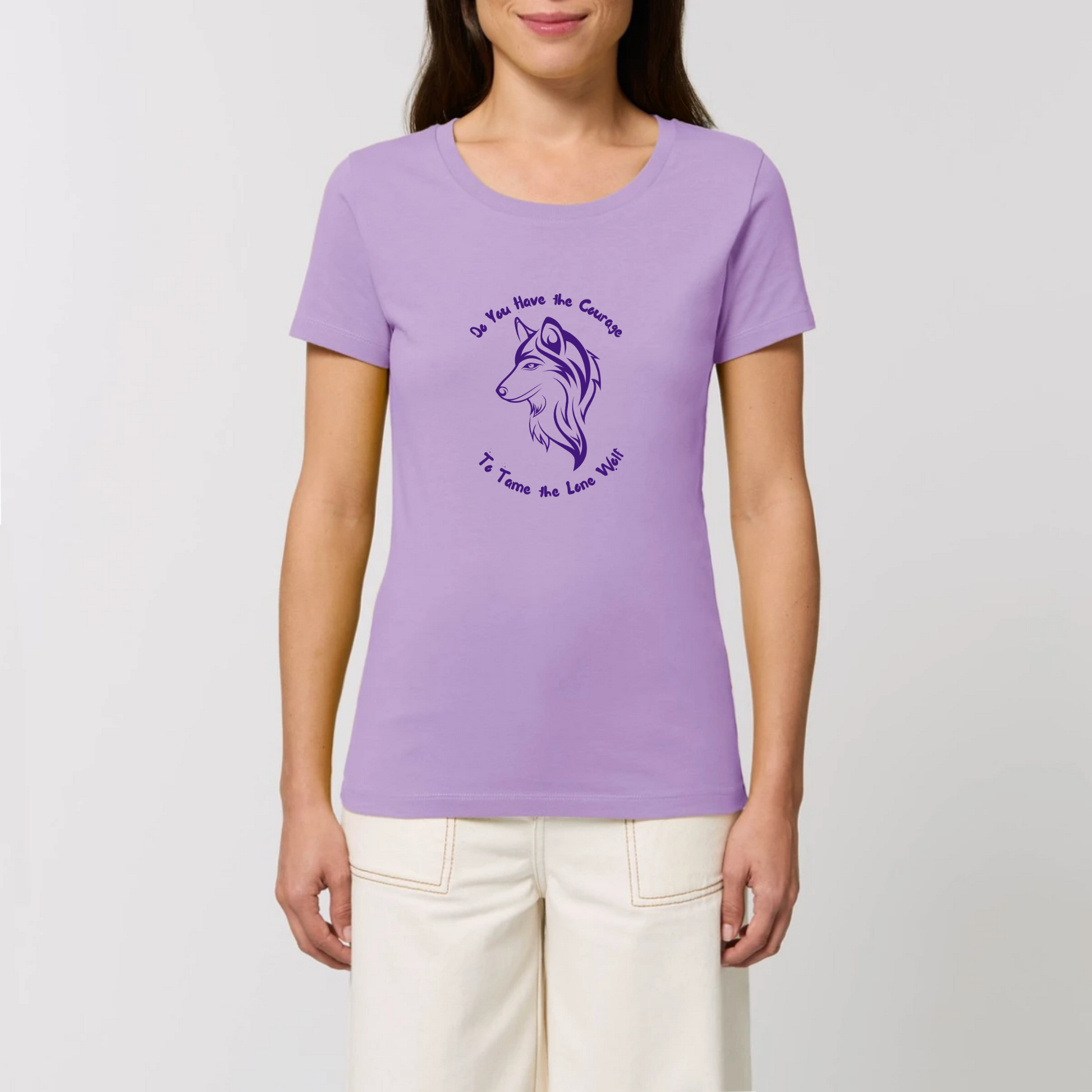 Graphic design t-shirt for women which features a feminine wolf head with wording above and below the wolf head saying Do You Have the Courage to Tame the Lone Wolf. The t-shirt is lavender