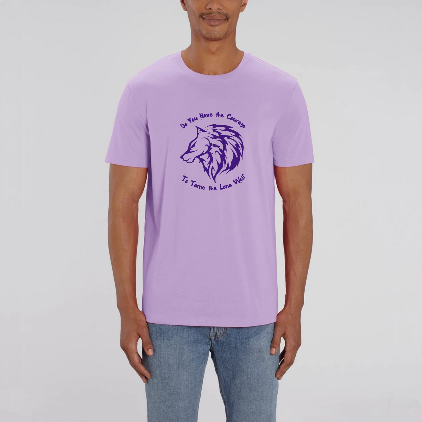 Graphic design t-shirt for men which features the head of a lone male wolf with the words "Do You Have the Courage to Tame the Lone Wolf". The t-shirt is lavender