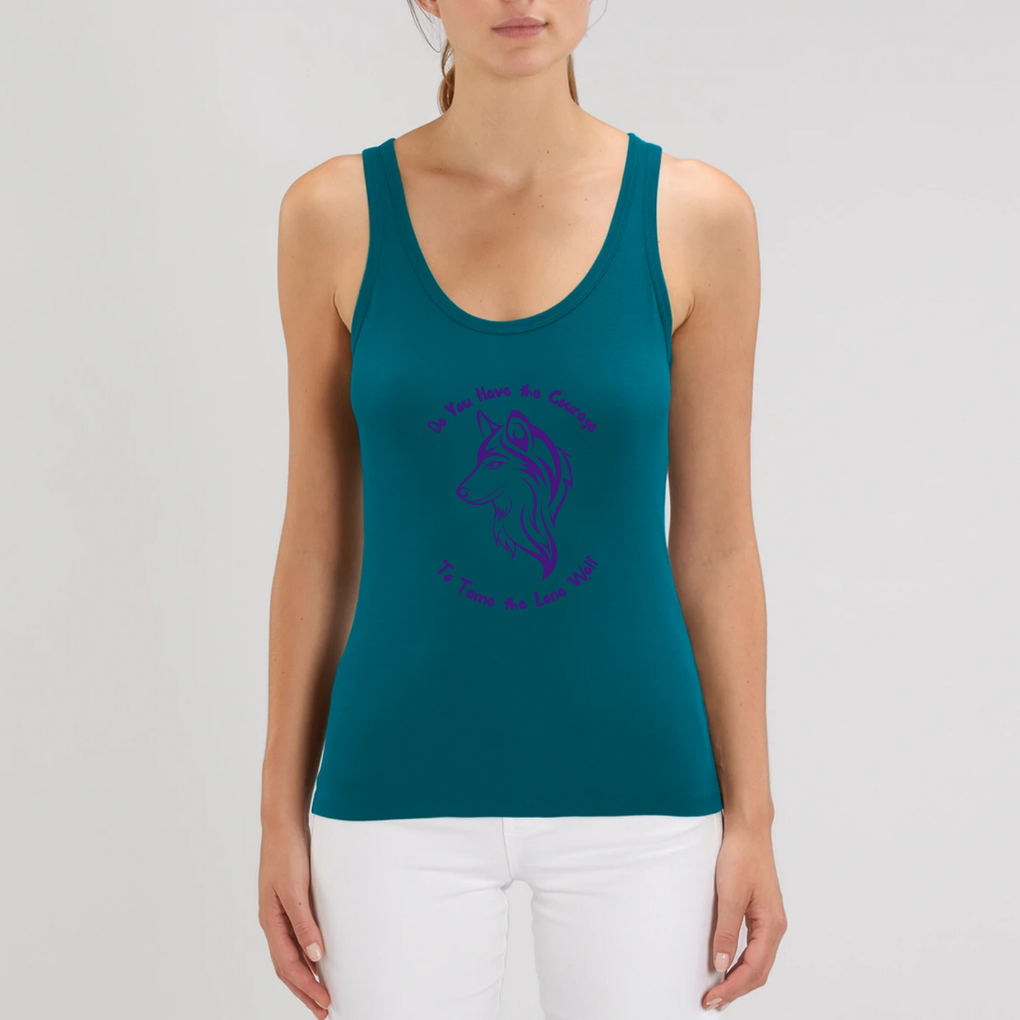Model wearing a tank top with graphic design of a lone female wolf with wording Do you have the courage to tame the lone wolf. The tank top is ocean blue