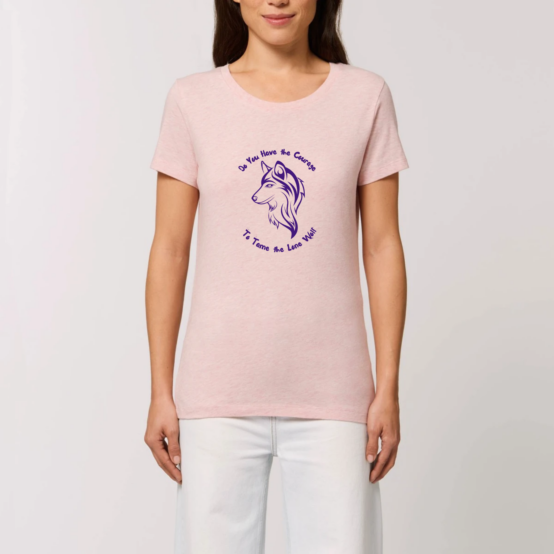 Graphic design t-shirt for women which features a feminine wolf head with wording above and below the wolf head saying Do You Have the Courage to Tame the Lone Wolf. The t-shirt is pink