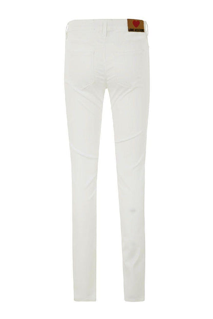 Love Moschino Women's White Cotton Jeans designed by Love Moschino available from Moon Behind The Hill 's Clothing > Pants > Womens range