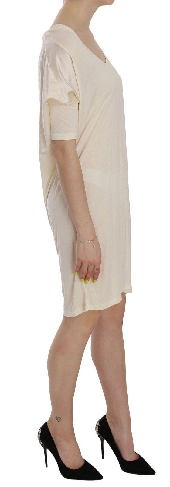 Cream Round Neck Knee Length Dress - Designed by Costume National Available to Buy at a Discounted Price on Moon Behind The Hill Online Designer Discount Store